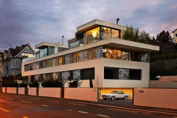 Standard listing photo of a modern villa exterior at dusk
