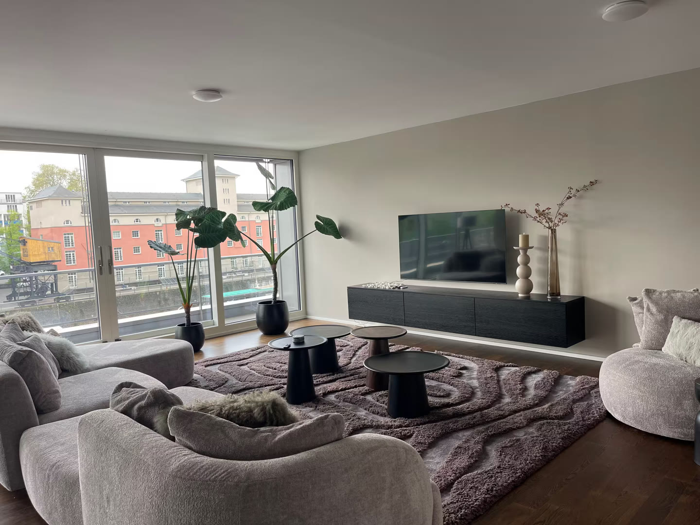 Standard photo of a bright living room with harbour view