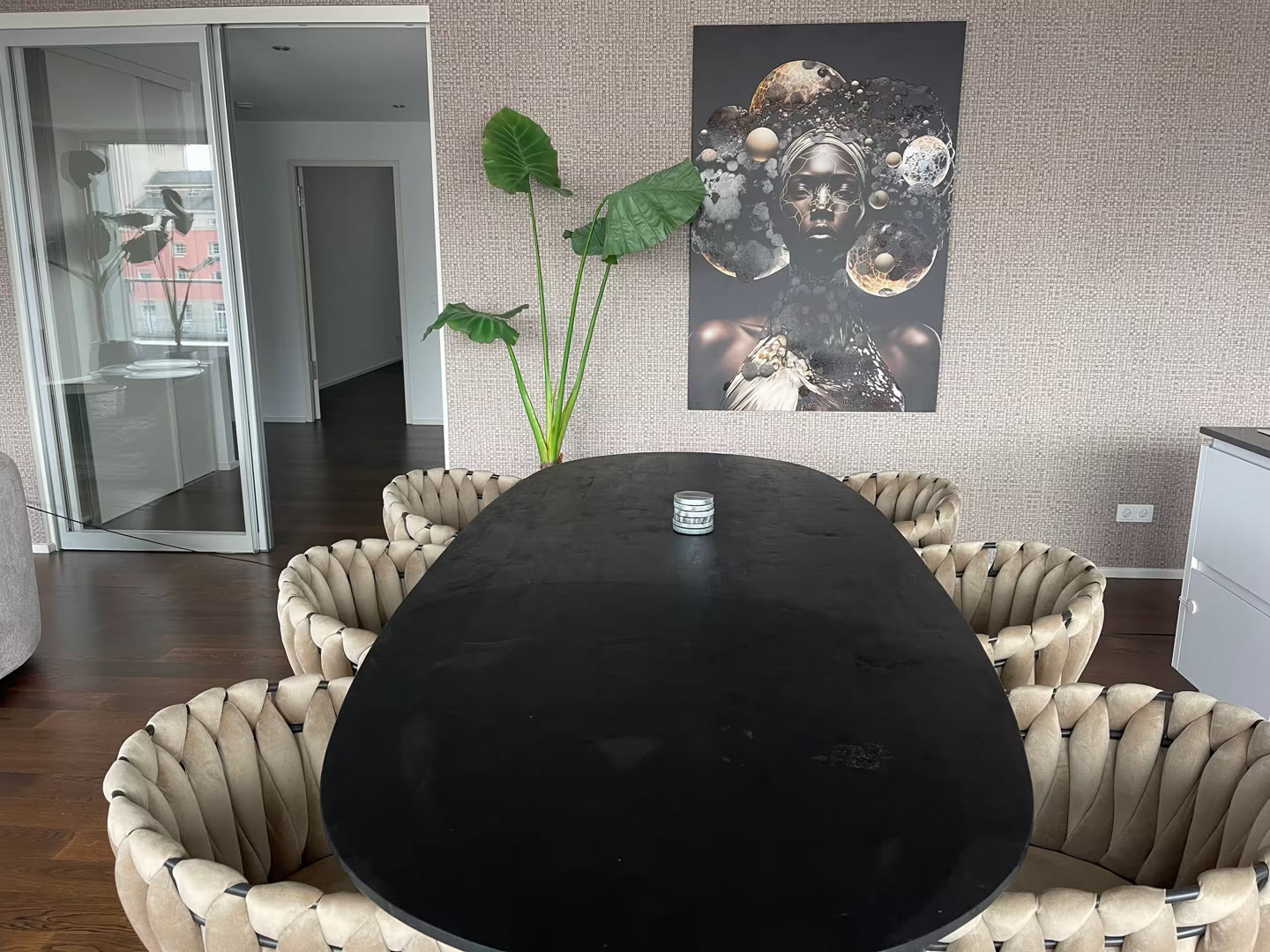 Standard photo of a dining table with artwork